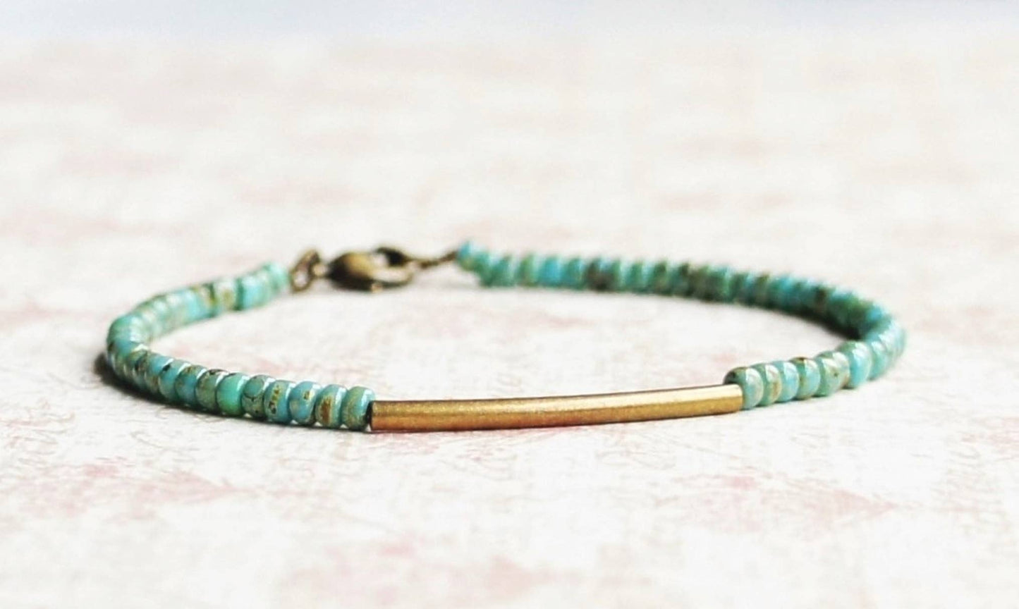 Turquoise Blue Seed Beads And Bronze Bar Bracelet: 7"